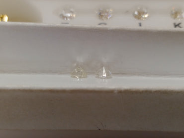 2 Round Brilliant Diamonds .64 TCW H-J SI Goods