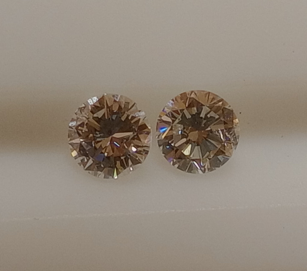 Matched Pair of Natural Round Brilliant Cut Diamonds 0.90 CTW I1-I2 GH
