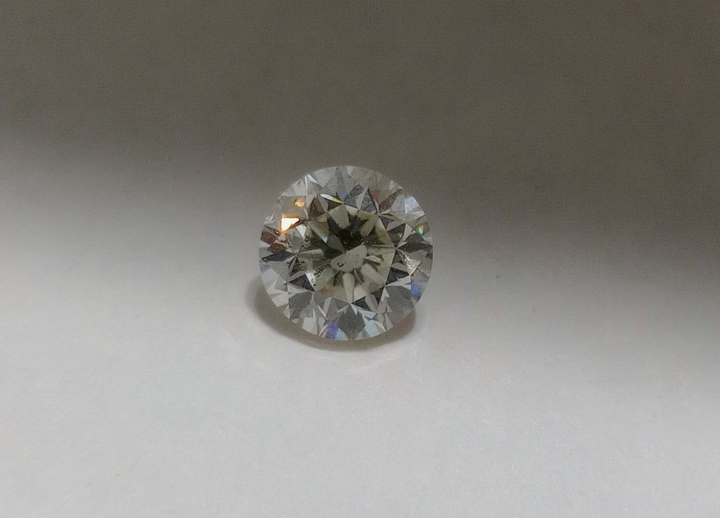 0.81 CT Round Brilliant Natural Diamond L-M SI2-I1