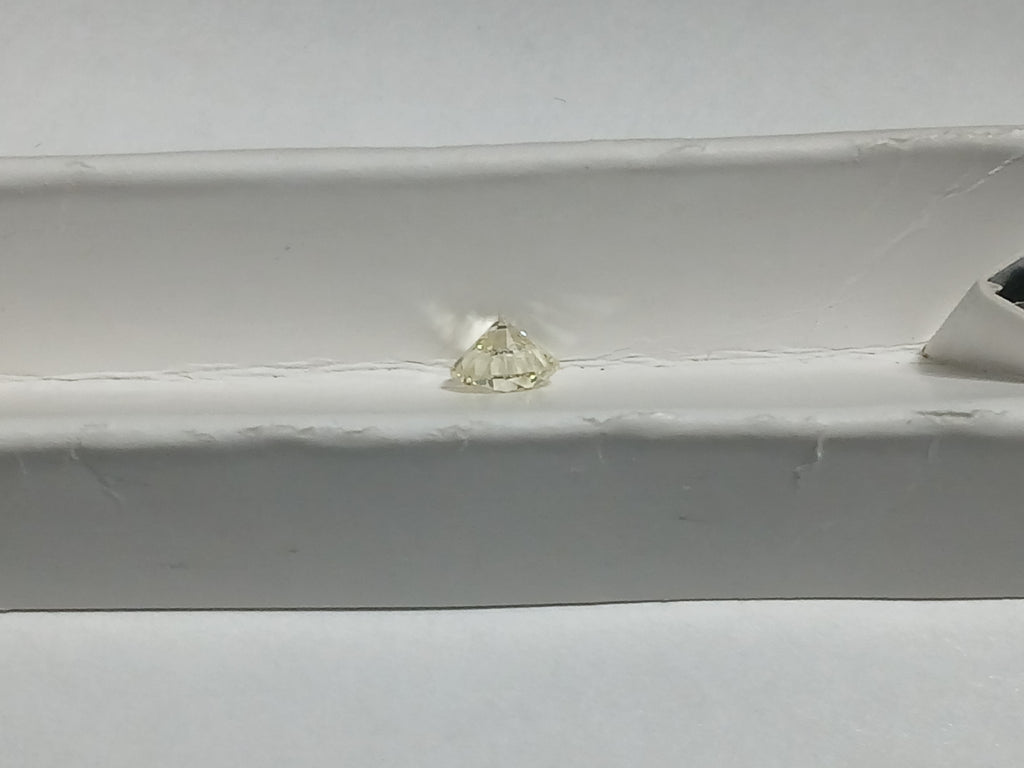 0.71 CT Round Brilliant Natural Diamond M I1