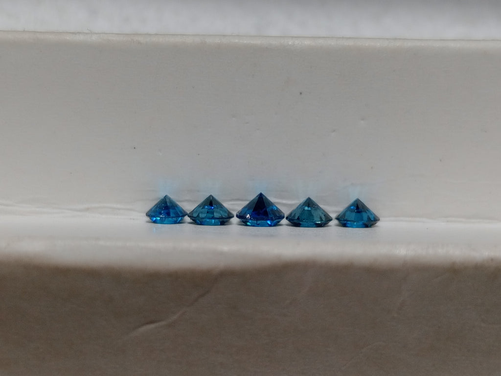 0.57 CTTW Round Blue Treated Natural Diamonds (5)  I1-I2