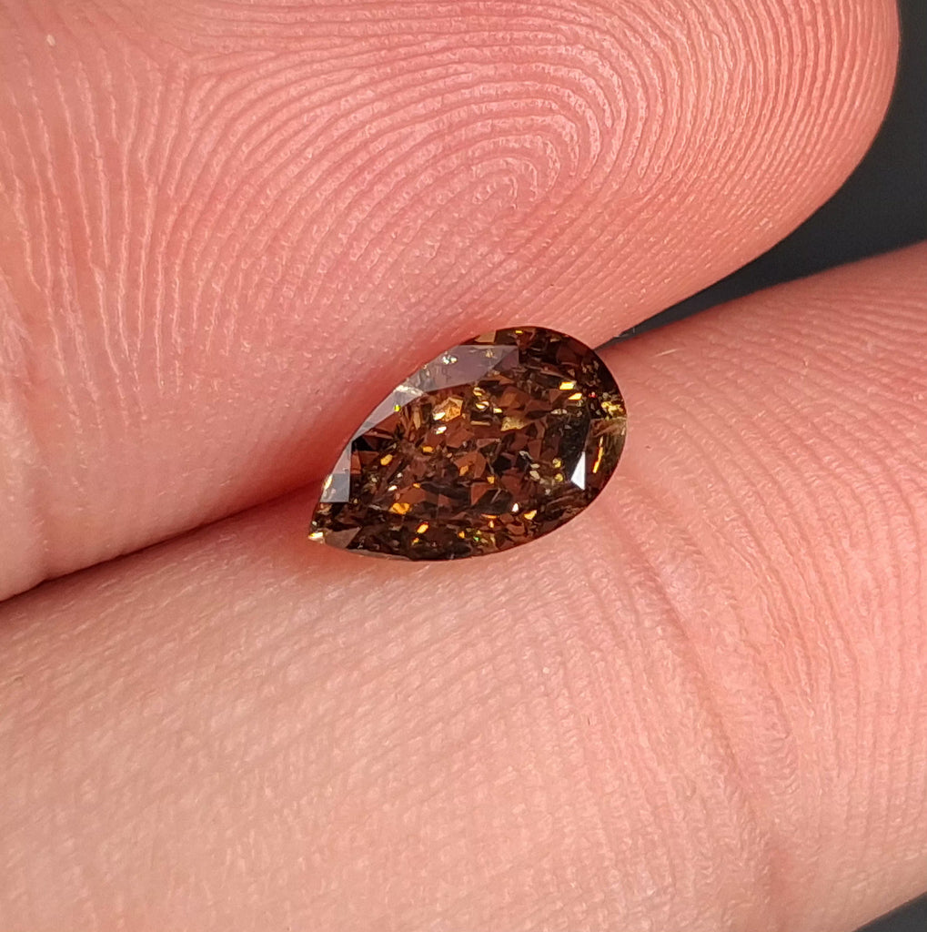 1.01 CT Natural Dark Brown Pear Cut I1