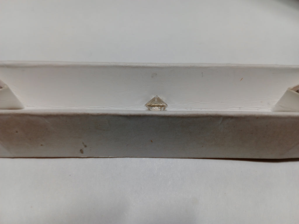 0.95 CT Round Brilliant Natural Diamond N SI2-I1