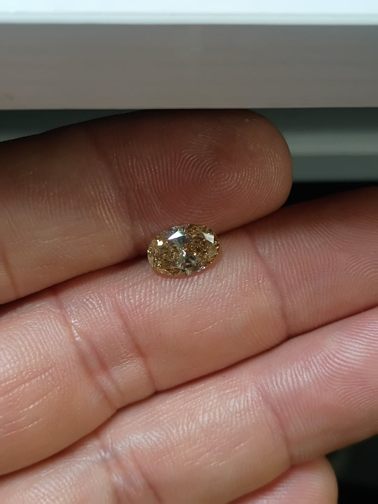 1.52 CT Natural Oval Brilliant Light Brown I1