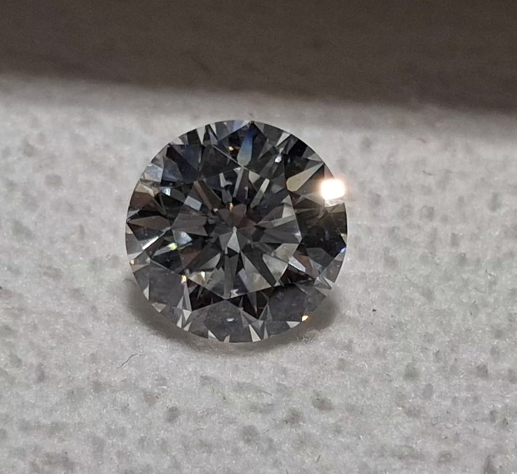 1.62 CT Natural Round Brilliant EF SI1 - Small Chip on Culet